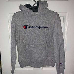 Brand is champion size is large in kids and it’s grey